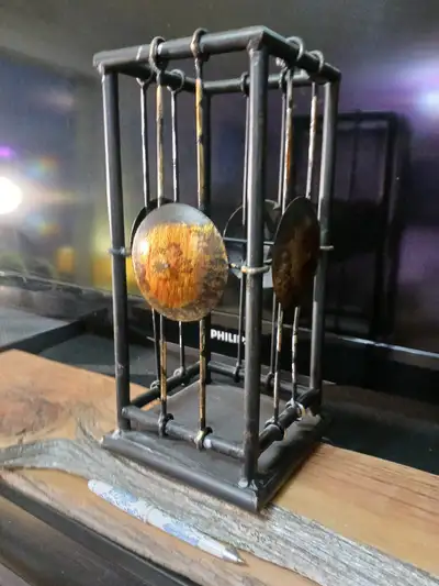 4 sided metal Art. Quite heavy.