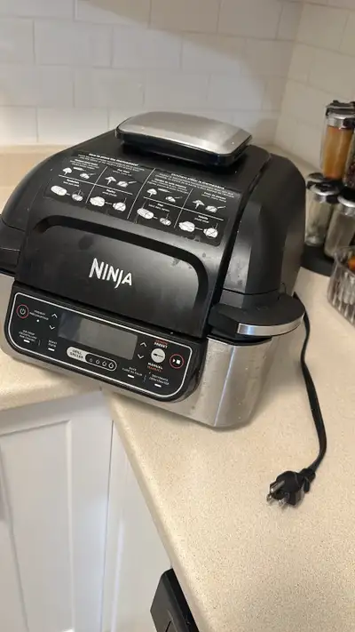 Ninja Foodi Smart XL Grill – Air Fryer + Multi Cooker, View more
