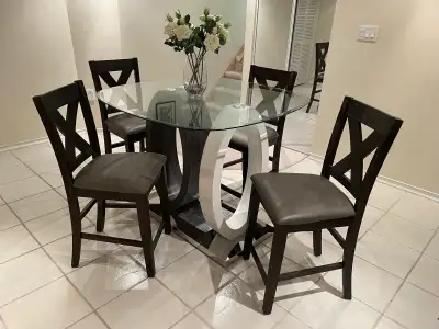Counter high glass table and 4 chairs , View more