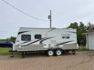 Barely used travel trailer manufactured by Outdoors RV, model 18CK (Center Kitchen) Took it back and...