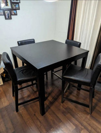 Nice and sturdy high table with 4 chairs