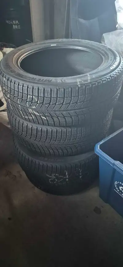 4 Michelin X-Ice tires. Used for a few years, lots of tread left 8/32.