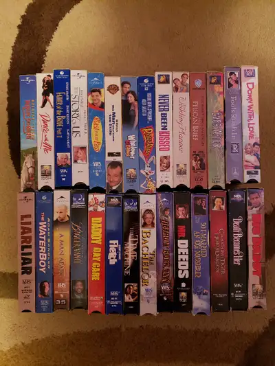 vhs tapes 5.00 each, double tapes are 7.00 each, the stand 15.00