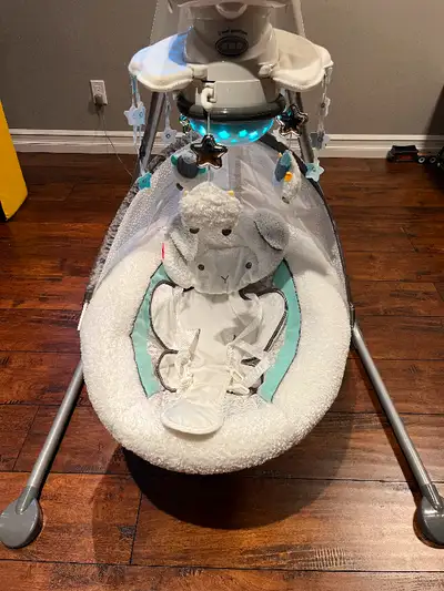 Fisher Price lamb Baby Swing in excellent condition. Swing moves back and forth, has 3 positions, pl...