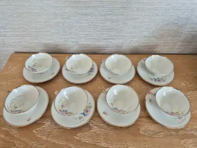 I am selling a set of eight vintage floral tea cups with saucers, each bearing the mark of LHS Bavar...