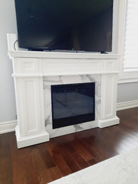 GENTLY USED CANVAS MARSEILLE ELECTRIC FIREPLACE/TV STAND!!