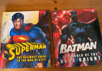 2 large graphic books Superman and Batman 