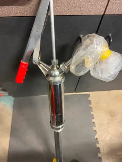 Selling my Hand Pump for 45 gallon drums/barrels. quality metal pump from greggs. works great. don't...