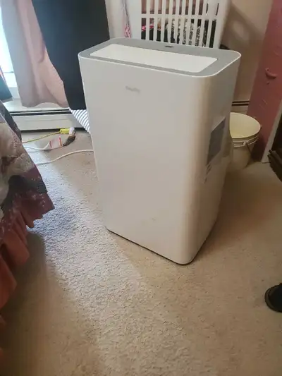 Portable air conditioner with hose Text 306 581 6571 for more info