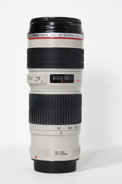 Included: Canon EF 70-200mm f/4 L USM Lens Front & Rear Caps Canon Lens Hood ET-74 Canon Lens Pouch...