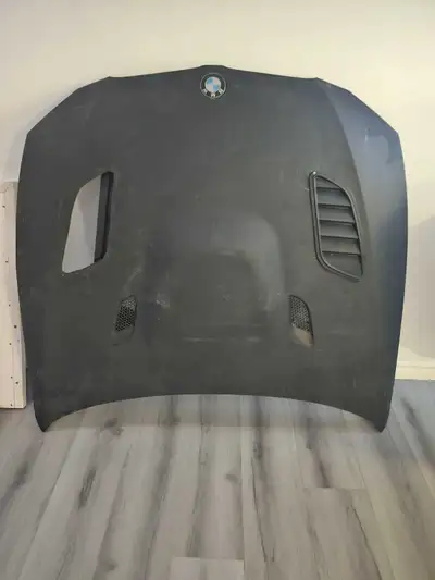 M3 E46 This BMW hood features functional air vents and a sporty aesthetic. When used, it offers an a...