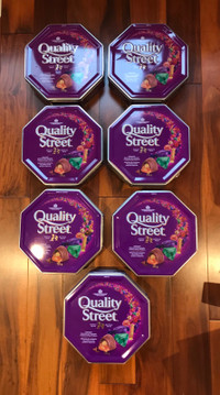 7 Empty Quality Street Candy Tins. 8 inches diameter