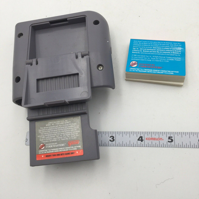 Game Genie Nintendo Game Boy GameBoy Model 7359 w/ Code Book in Older Generation in Burnaby/New Westminster - Image 2