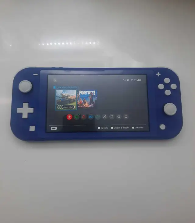 Nintendo Switch Lite Blue à vendre in Nintendo Switch in Laval / North Shore - Image 4