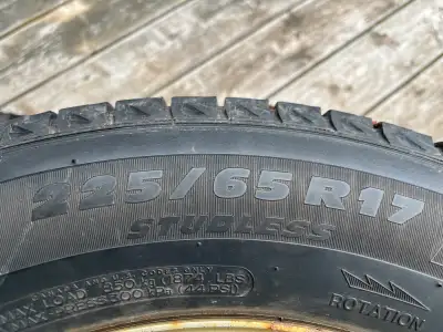Used winter tires on old CRV rims. Slightly cracked and weathered. 1/3 tread left, you could probabl...