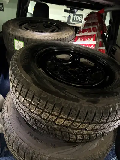 Toyo 255/65/R18 Winter tires. Less than a 1000kms on them last February. Been in storage at the deal...