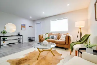 This rare, modern three-level townhouse-style condo offers unbeatable versatility and value. Built i...