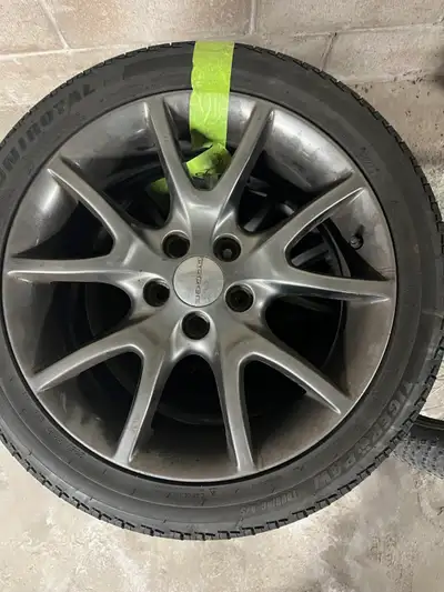 Four Uniroyal Tigerpaw T/P Touring (225/45r17) tires on rims for sale. $250 or best offer. Rims orig...