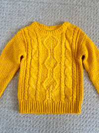 Cable-knit yellow sweater