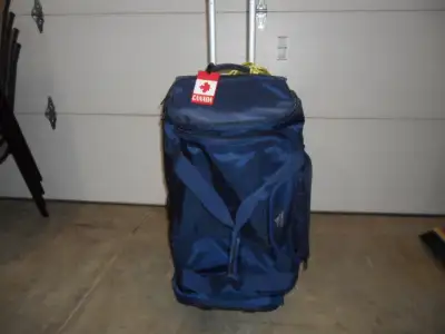 Rolling duffle bag approx 13x30 inches