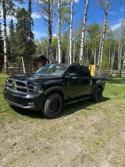 2012 Dodge Ram 1500 4x4 hemi engine (no hemi tic )has power windows and doors .Runs and drives great...