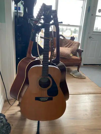 Yamaha guitar with hard case $200. phone 1-780-975-2883 O’Leary, View more