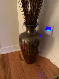Vase with sticks