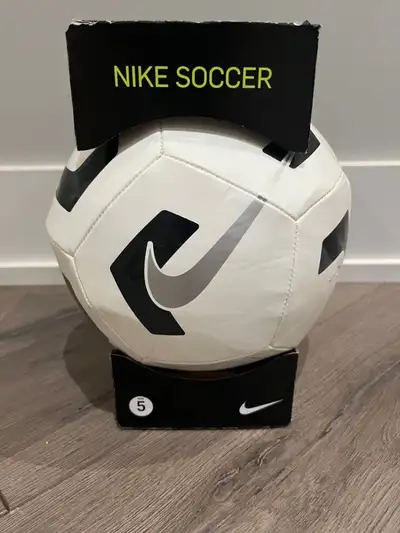 Never used size 5 soccer ball. The Nike Pitch Training Soccer Ball is a durable design built for int...