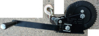 hand Rhino winch, 1000lb, new unused, with strap & hook, $25