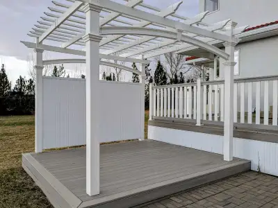 10' x 10' PVC pergola / gazebo for sale. One side is solid panel to protect from the wind. Asking $7...
