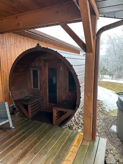Mint condition 10 foot barrel sauna. Has steel roofing upgrade so water tight and will last. Has 2 f...