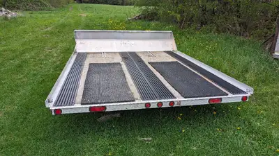 Triton double skidoo trailer, 10 foot long. Tilt, lights work, $1750.00 obo