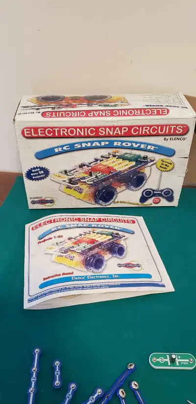 Two different sets of Elenco Snap circuits education electronics kits. My kids used these to learn b...