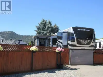 2020 Forest River Riverstone 39RBFL and fully fenced, private lot for sale in Holiday RV Park Resort...