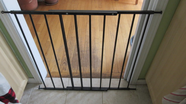 Black metal swing gate suitable for top of stairs in Gates, Monitors & Safety in Ottawa