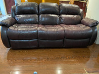 Two Identical leather recliner sofas $300