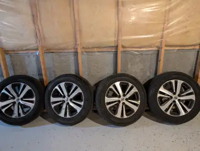 Antares Ingens A1 all season tires with some tread good for about one season mounted on Subaru OEM a...
