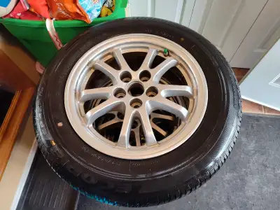 Set of four genuine Toyota aluminum rims with Bridgestone Ecopia (low fuel consumption) tires - size...