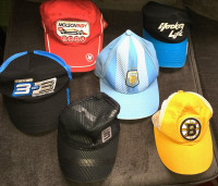 7 Sun hats e.g. Molson Indy, Boston Bruins, Argentina etc.