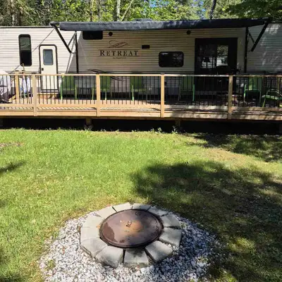 Located in Spruce Glen Trailer Park in coboconk.Situated on double lot. Salt water heated pool and c...