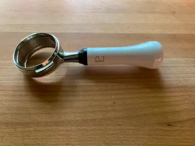 I have a leftover 58mm bottomless portafilter from Pullman that I do not need anymore. I bought this...