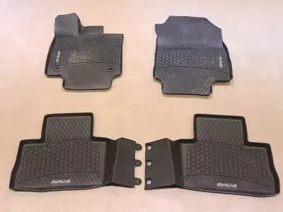 Heavy-duty rubber floor mats from a RAV4. 4 pieces in total, including: - Front Left and Right Passe...