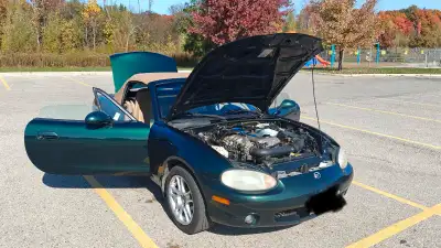 For sale is my 1999 Miata. 5 speed manual, green with tan top. This was the highest spec in 99': -To...