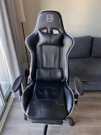 Gaming/ leather work chair with adjustable height. Reclining