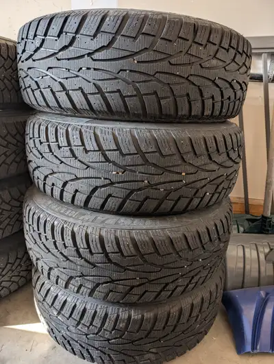 225 65 17 Uniroyal Tiger Paw winter tires with 5x108 rims. Great winter tires with rims. Fit Ford Es...