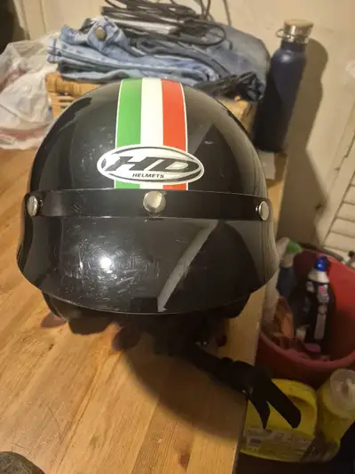 I am selling a HJC cruiser helmet, size medium, with a sleek black finish and stylish Italian stripe...