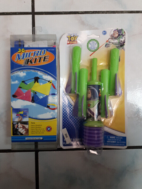 3-D Micro Kite & Disney Toy Story Rocket toy - BNIB. Unopened in Toys & Games in City of Toronto