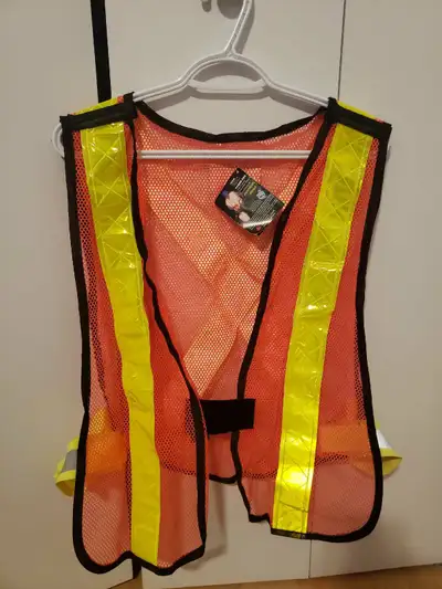 I'm offering a brand new Super Bright traffic vest, size XL, perfect for ensuring visibility and saf...