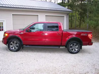 For sale 2014 Ford F150 FX4 Loaded well maintained and under coated regularly nonsmoker Ruby Red /Gr...