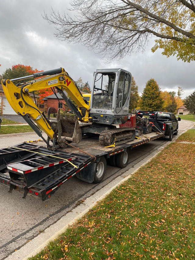 Float Moves Flatbed Services • Tractors • Skid Steers Heavy Equipment